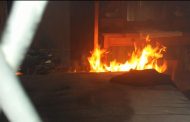 Paramedics attend to victim of house fire in Oslo Beach near Port Shepstone