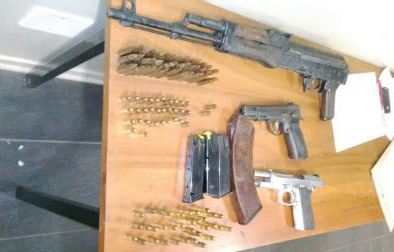 Suspect arrested in possession of unlicensed firearms and ammunition