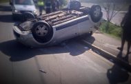 Three injured in vehicle rollover, Redhill