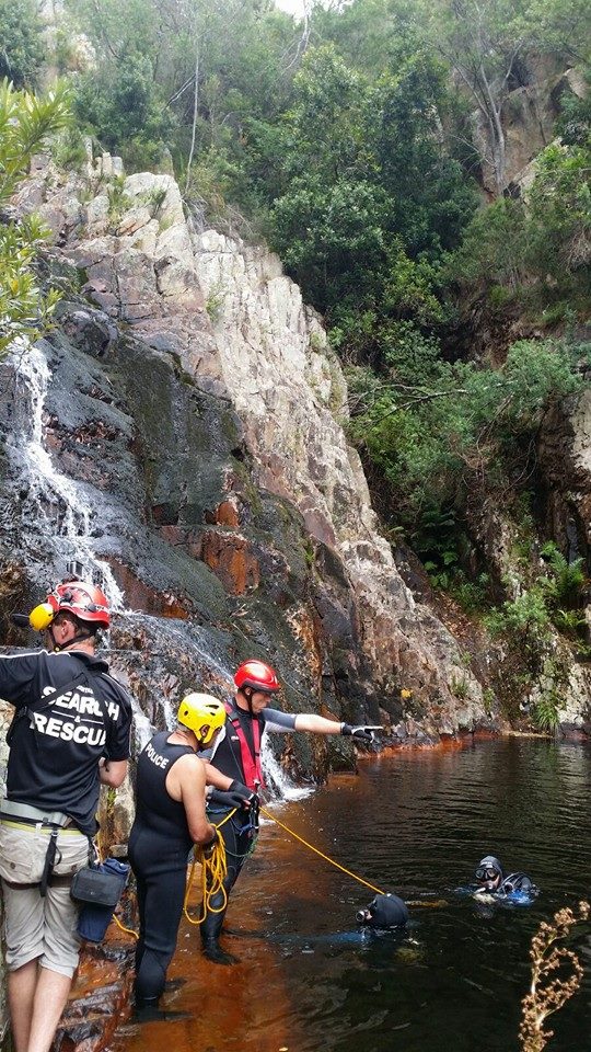 Police search and rescue retrieve body of man from waterfall