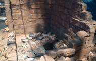 Woman rescued from pit toilet