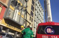 Cape Town Man brought down safely from building