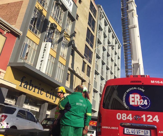 Cape Town Man brought down safely from building