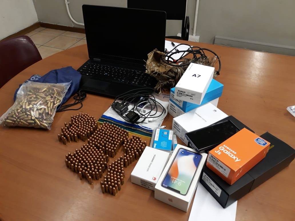 More than 700 rounds of ammo, several cellular telephones, sim cards and laptops recovered in Crossroads, Nyanga.