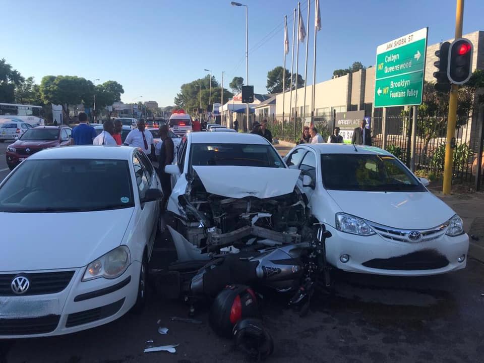 Three cars and a bike in collision at intersection in Pretoria