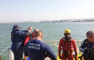 Police divers in Search and Rescue in the channel near Wilson's Wharf, Durban