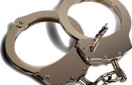 Suspect arrested after police officer is struck by fleeing vehicle