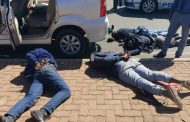 One suspect shot and killed and four suspects arrested after police reacted swiftly to a business robbery at a jewellery shop