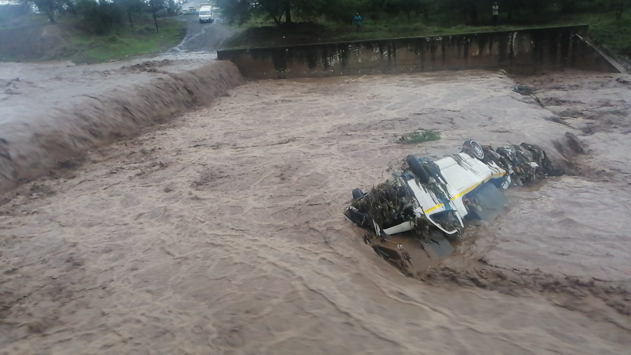 Taxi swept off bridge into the Duzi river