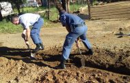 Police assist residents to drain flooded homes