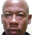 Appeal for wanted murder and fraud suspect