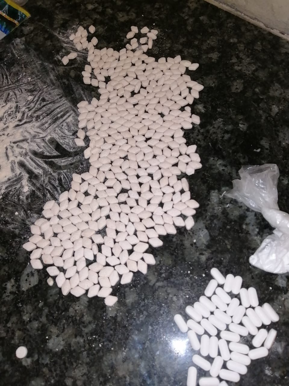 Suspects caught packing drugs