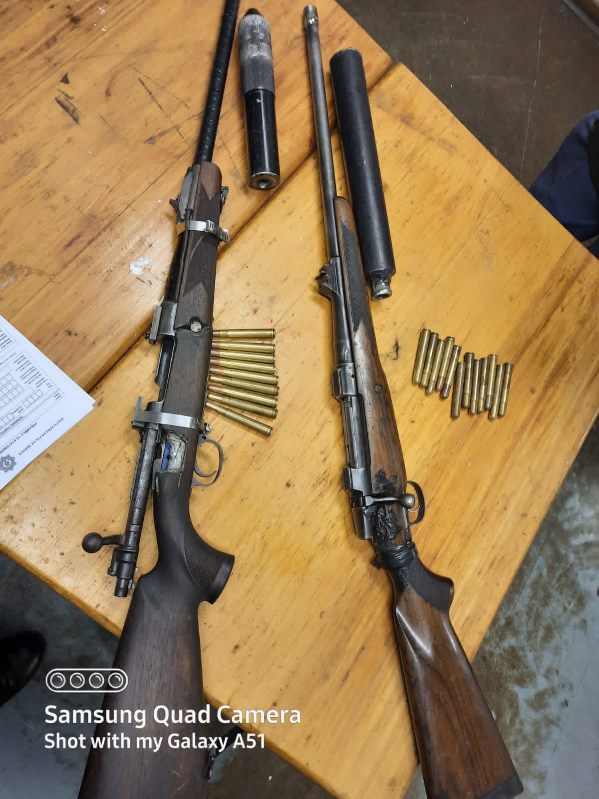 Seven firearms recovered, suspects behind bars