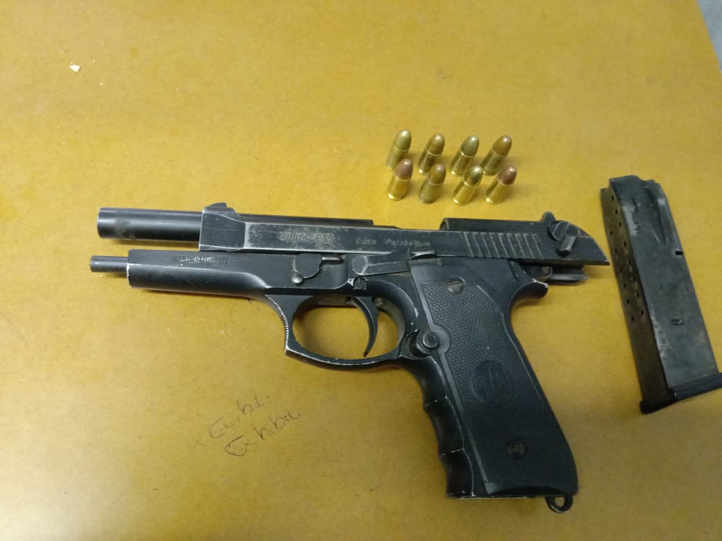 Police members bust suspects in possession of unlicensed firearms and ammunition