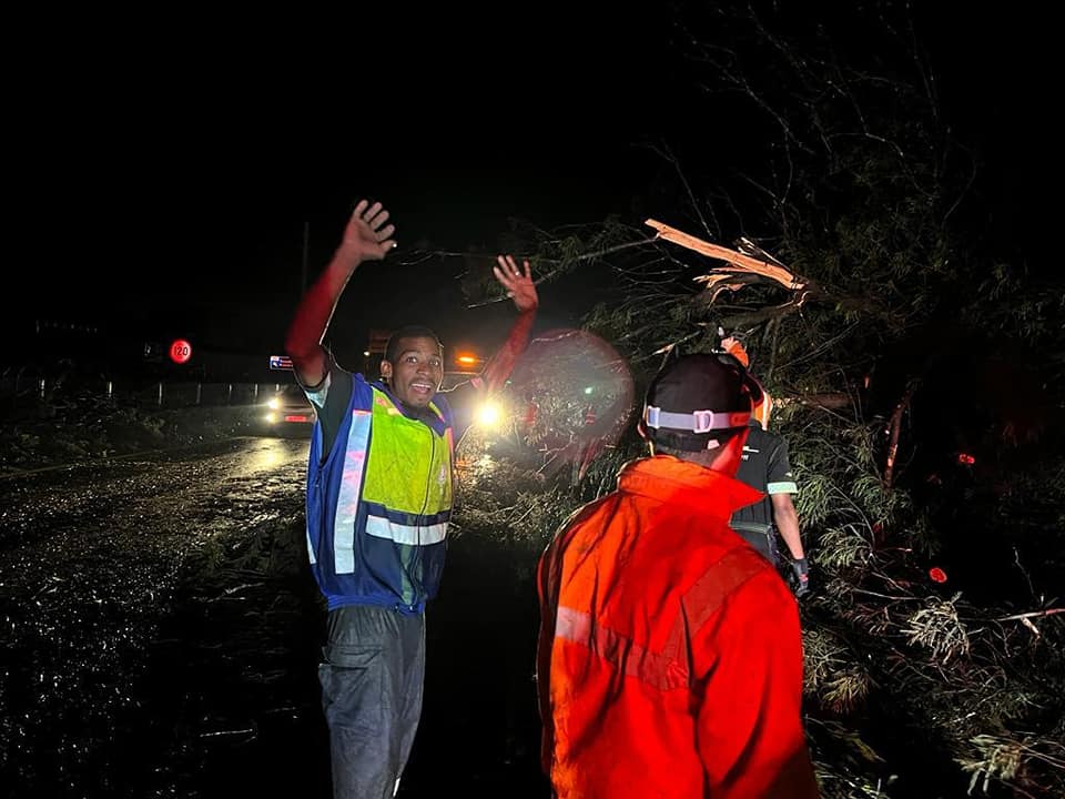 First responders help clear storm damage in midlands area.