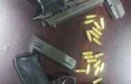 Wanted murder suspect nabbed with firearms