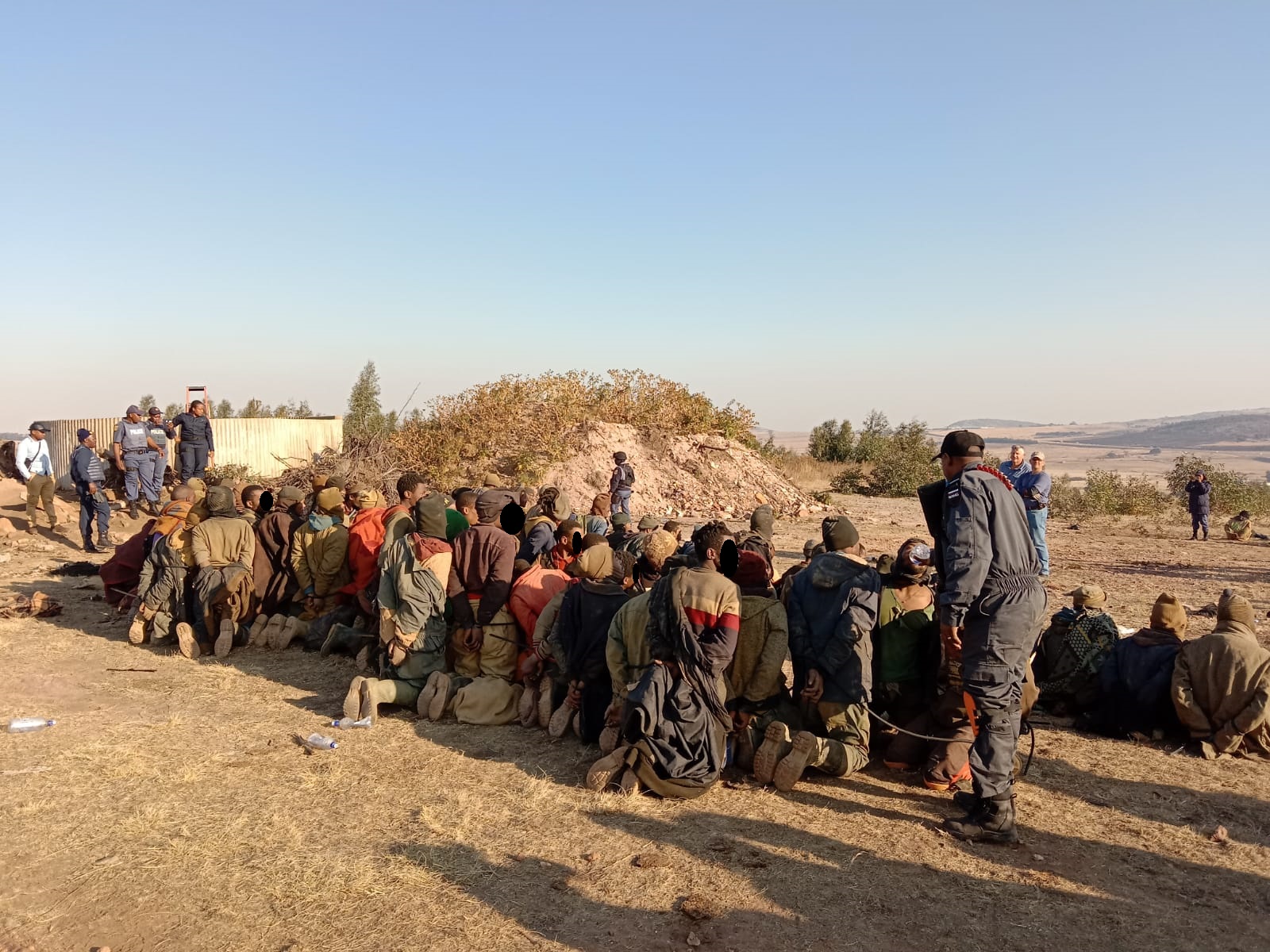 Ninety-seven illegal miners and a farm owner arrested