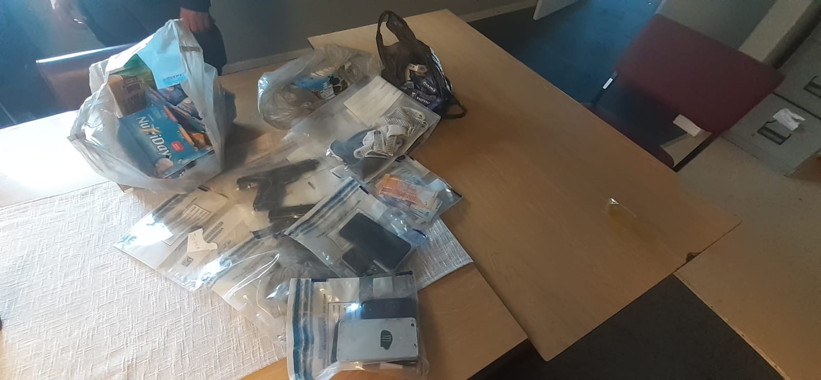 Partnership policing leads to arrests and the recovery of stolen property following a business robbery