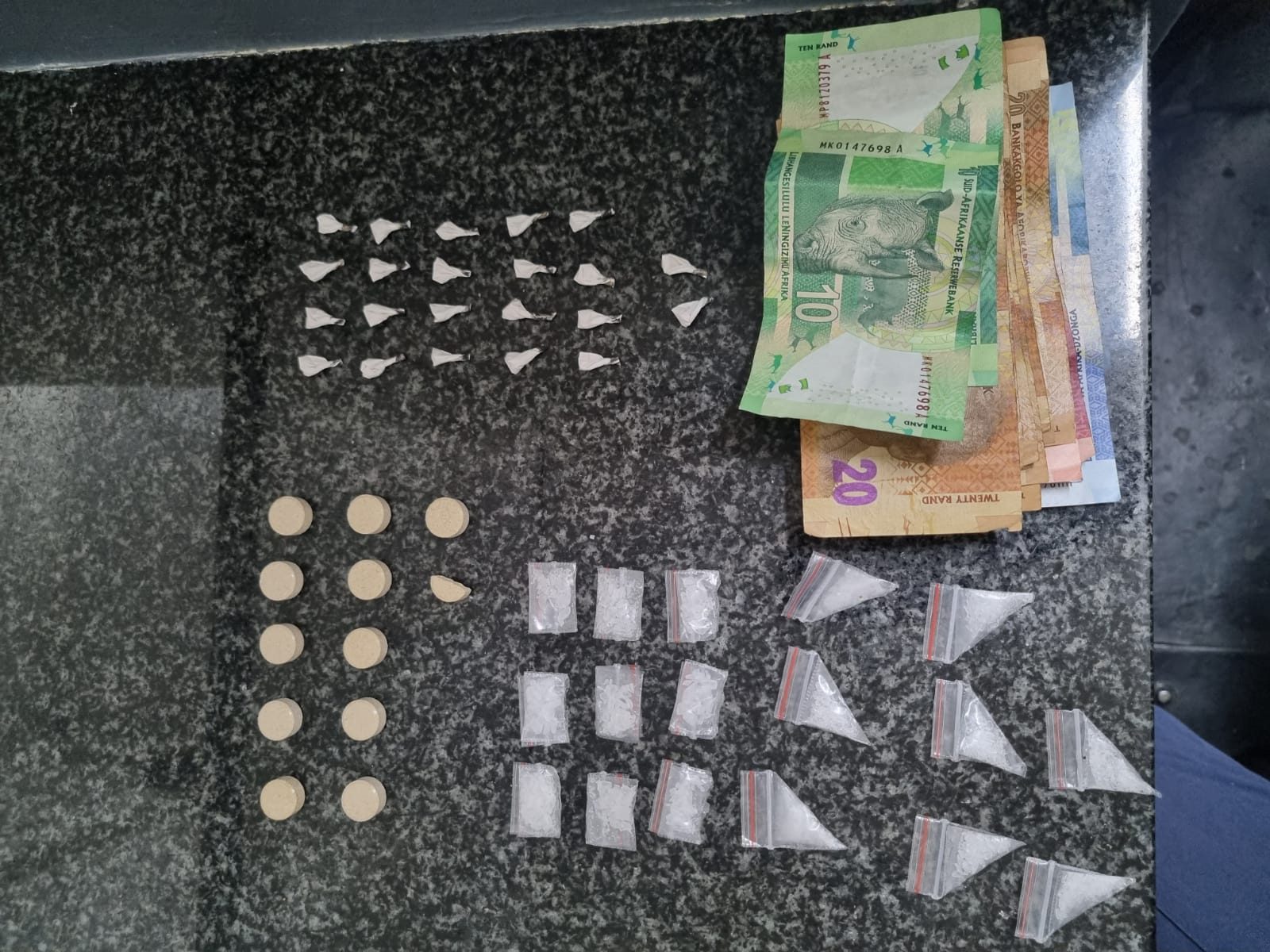 Anti-Gang unit members arrest suspects for illegal possession of firearms, drugs and attempted murder