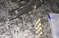 Police members arrest suspects for possession of unlicensed firearms and ammunition