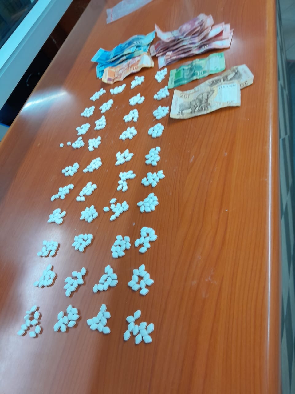 Police arrest suspects for the possession of ecstasy tablets