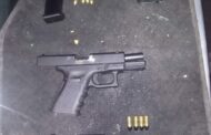 Three suspects on their way to court on charges of kidnapping and possession of prohibited firearms and ammunition
