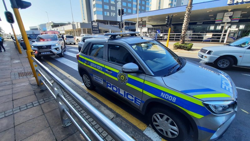 Police in pursuit of suspects after a jewellery store was robbed at gunpoint