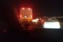 Stationary bus on R80 Mabopane Highway at Theo Martinspoort