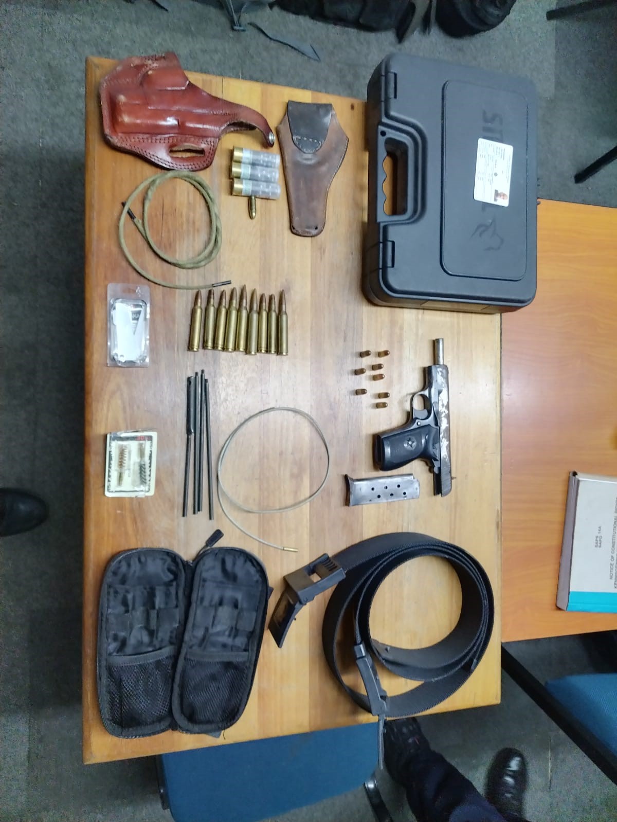 Taxi boss nabbed with unlicensed firearm and various assorted rounds of ammunition as well as SAPS belts