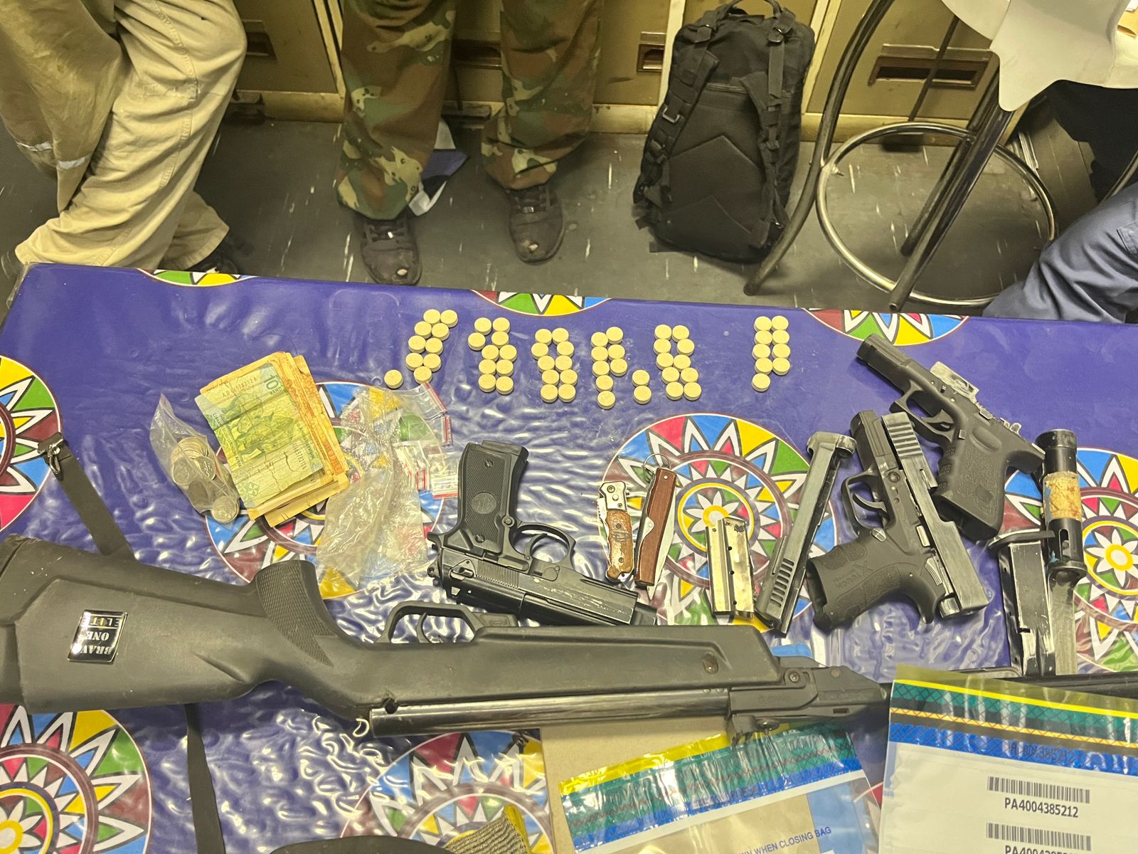 Two suspects arrested by vigilant Public Order Police members for possession of drugs and illegal firearm parts