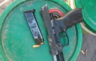 Police detain two suspects for possession of an unlicensed firearm and ammunition