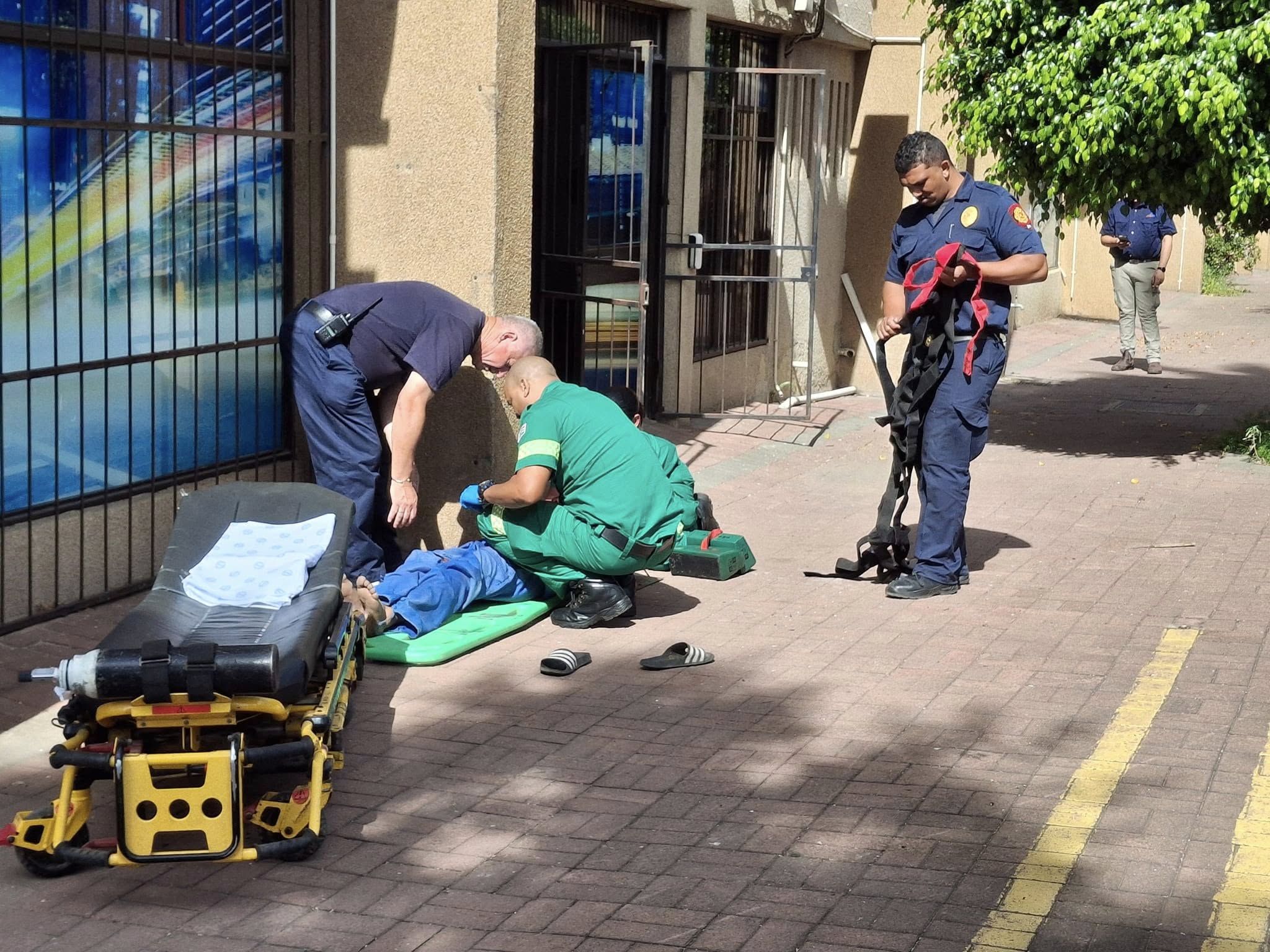 Emergency services are currently treating a man who fell out of a window at a building in Oudtshoorn