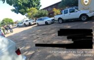 Murder suspect arrested and found in the possession of an unlicensed firearm