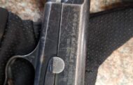 Two suspects arrested for illegal firearm possession following shooting incident