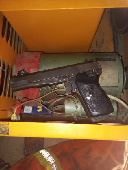 Suspect facing charges of unlawful possession of an unlicensed firearm, unlawful possession of live ammunition, and possession of suspected stolen property