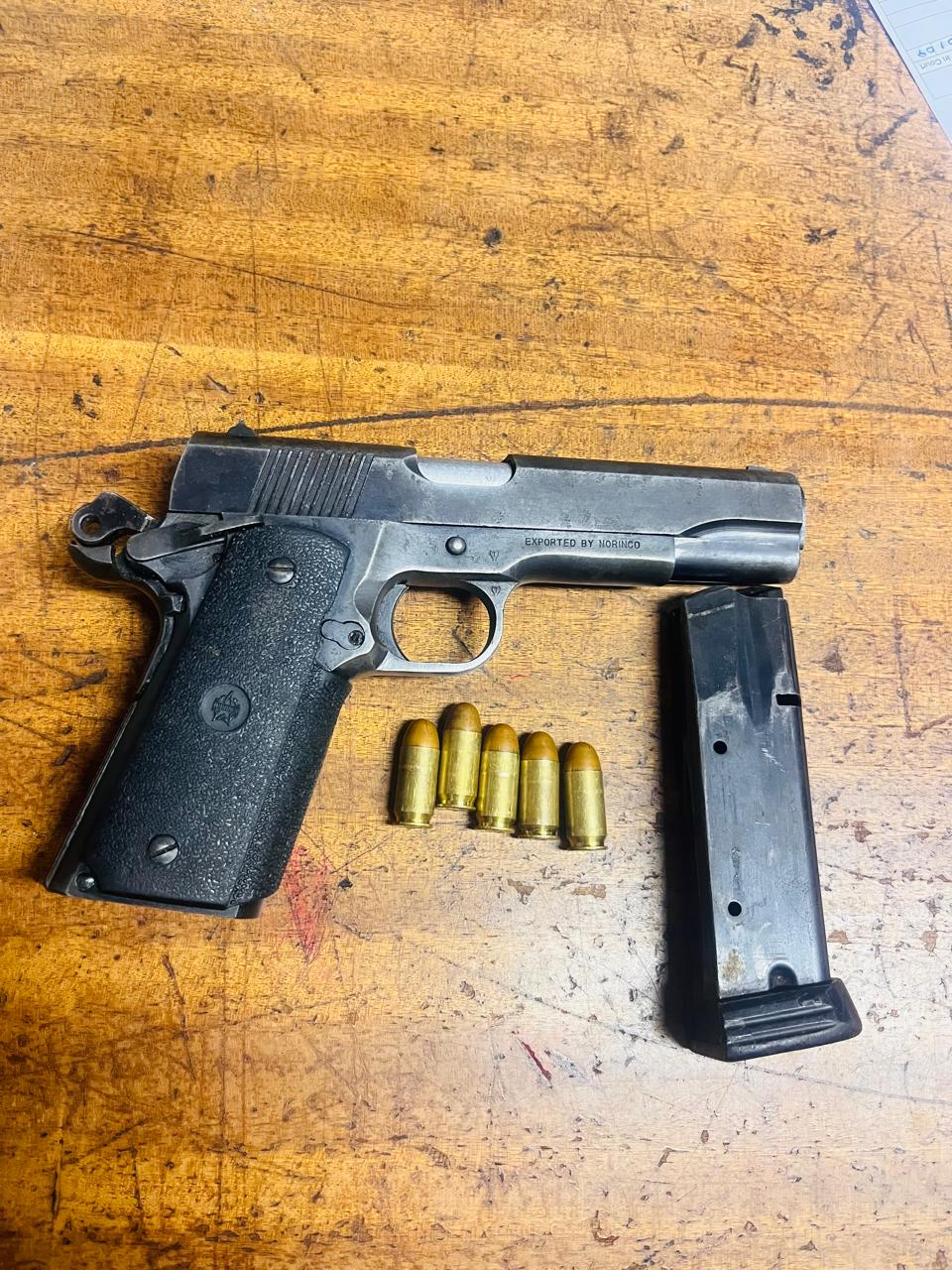 Woman arrested for the unlawful possession of a firearm and live ammunition