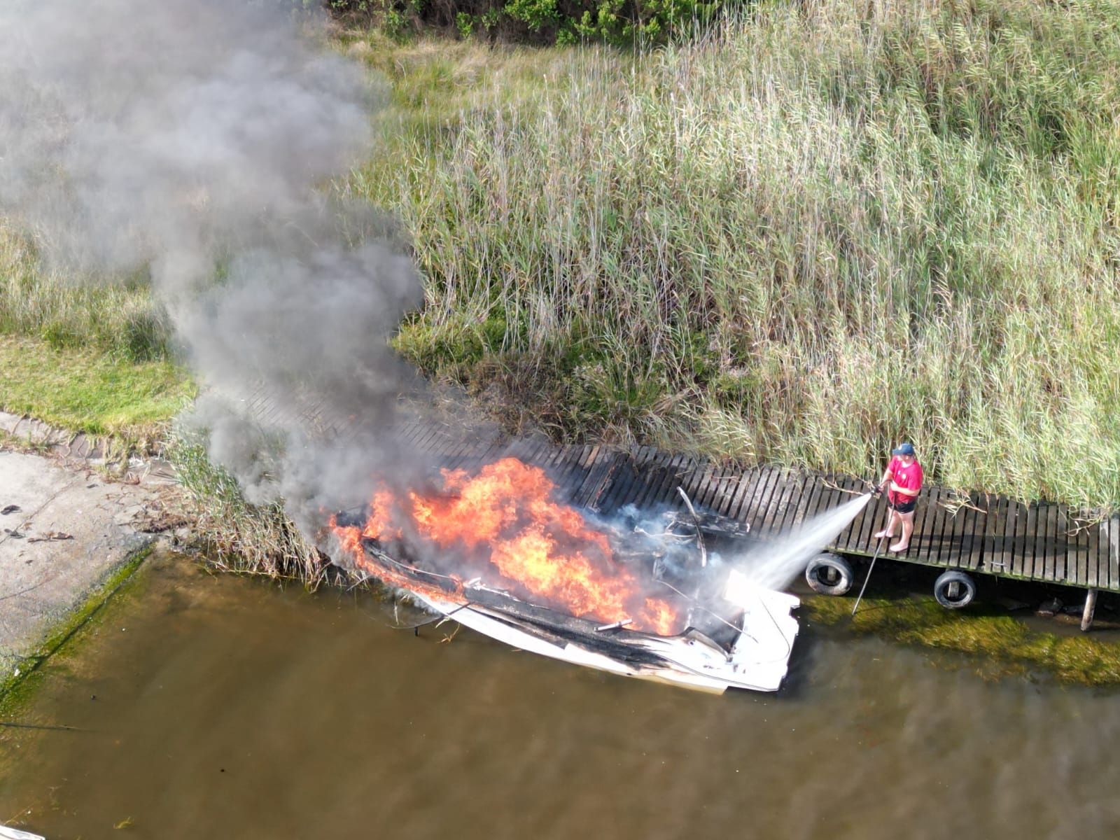 A boat caught fire at Island Lake in Wilderness
