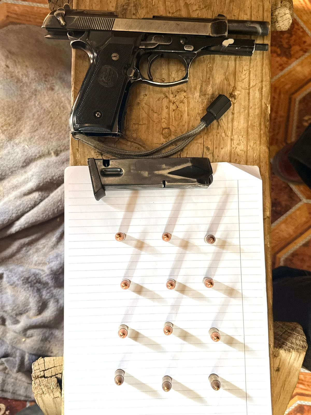 Suspect facing charges of possession of an unlicensed firearm and ammunition
