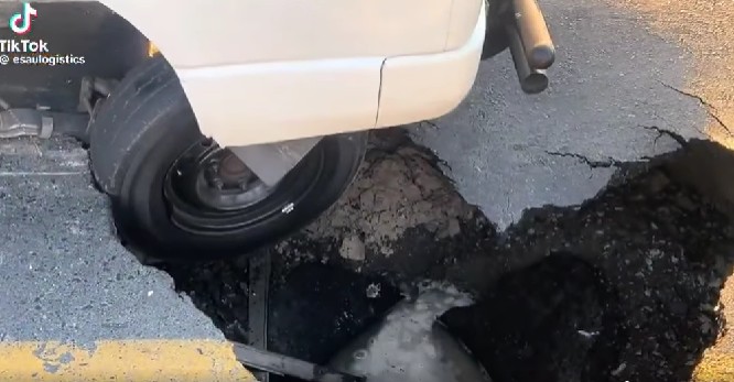 A taxi has hit a sinkhole along Delft Main Road in Cape Town