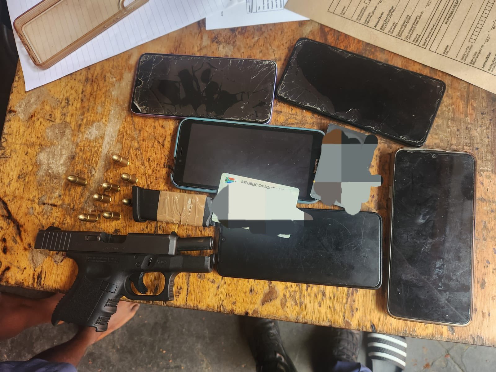 Suspects arrested for unlawful possession of a firearm as well as being in possession of goods suspected to be stolen