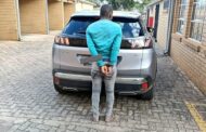 Robbery suspect arrested and stolen vehicle and household items recovered