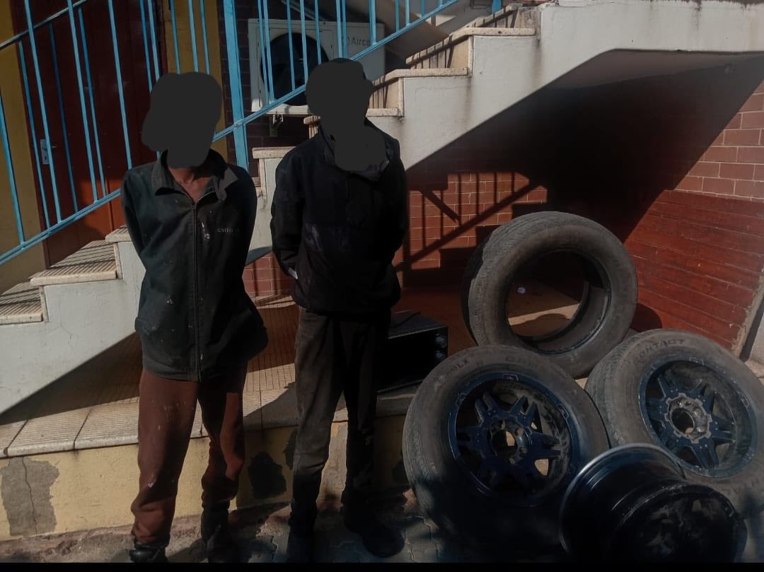 Two suspects arrested for possession of suspected stolen property linked to a business burglary