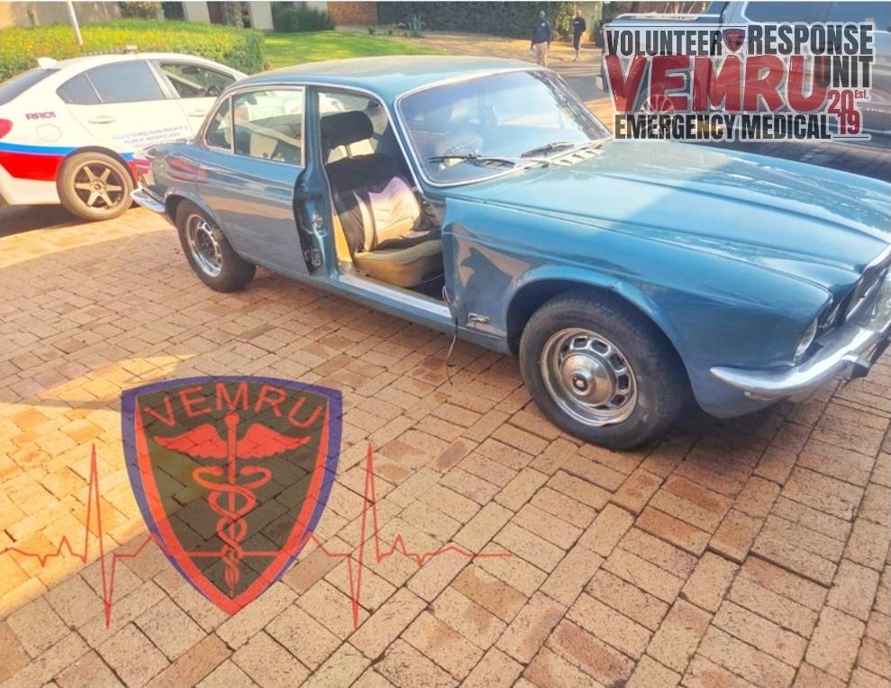 Man injured after the classic car that he was working on crushed him against a retaining wall