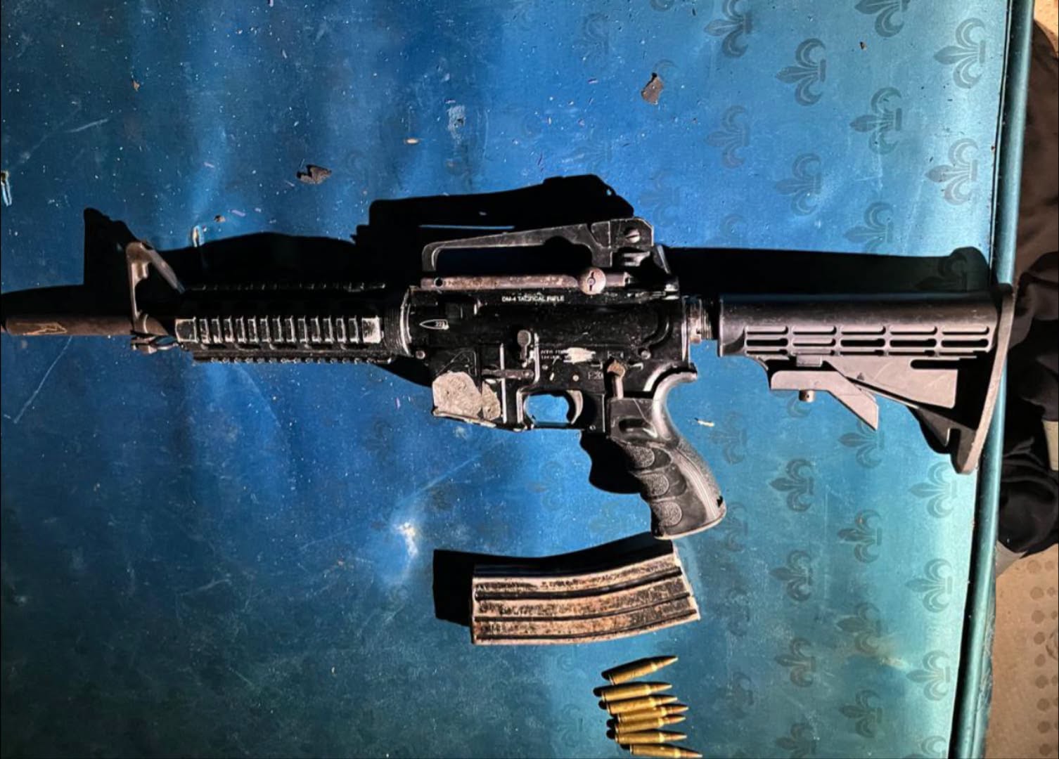Suspect arrested in Marite, Calcutta in possession of a rifle and pistol believed to have been used in the commission of serious and violent crimes in the area